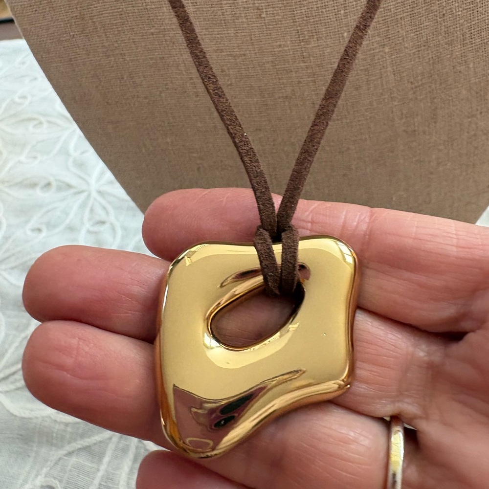 Elegant Gold Sculpture Long Pendant Necklace on Brown Cord - Picture 4 of 9